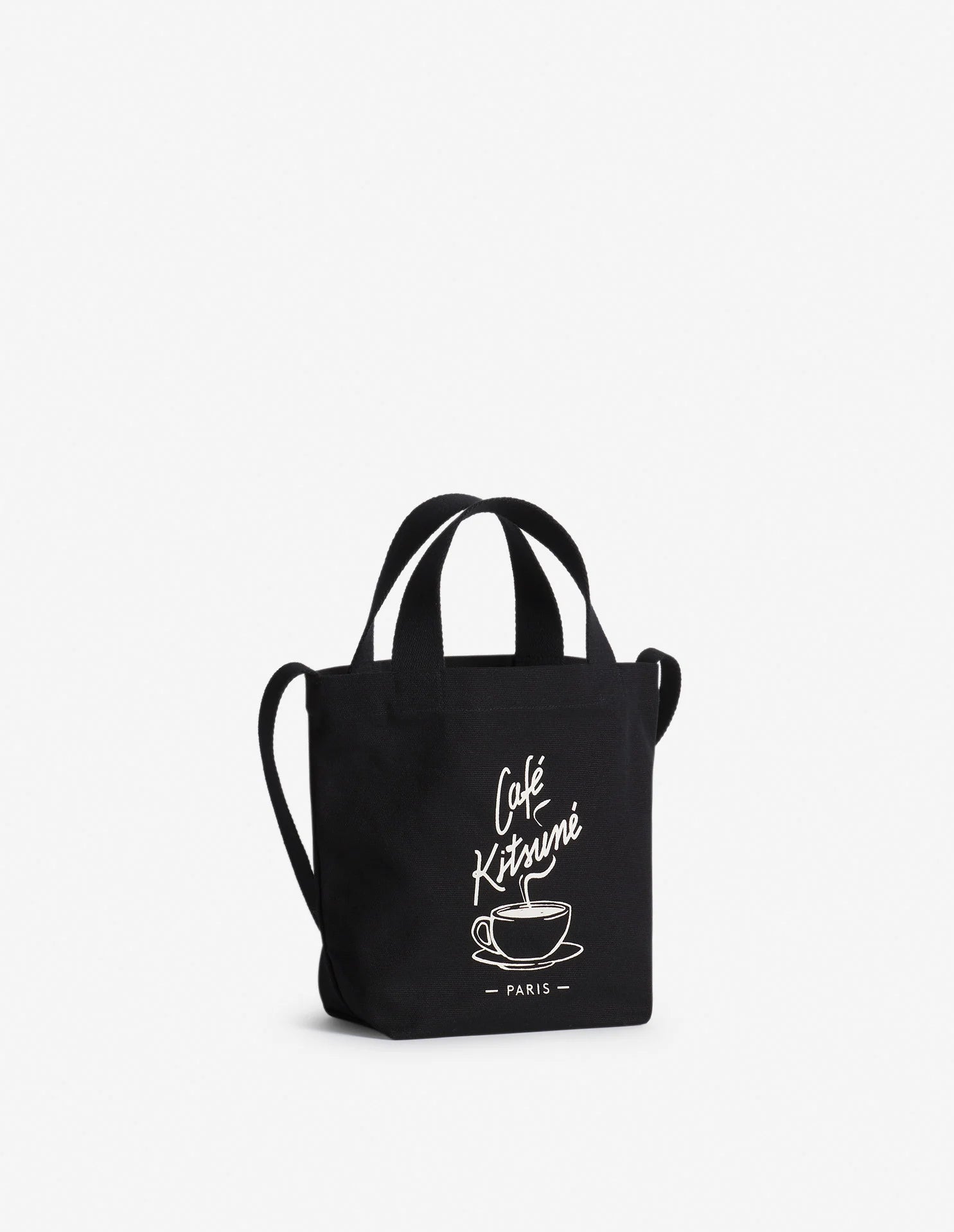 Vue du mini sac tote Café Kitsuné noir porté à l’épaule