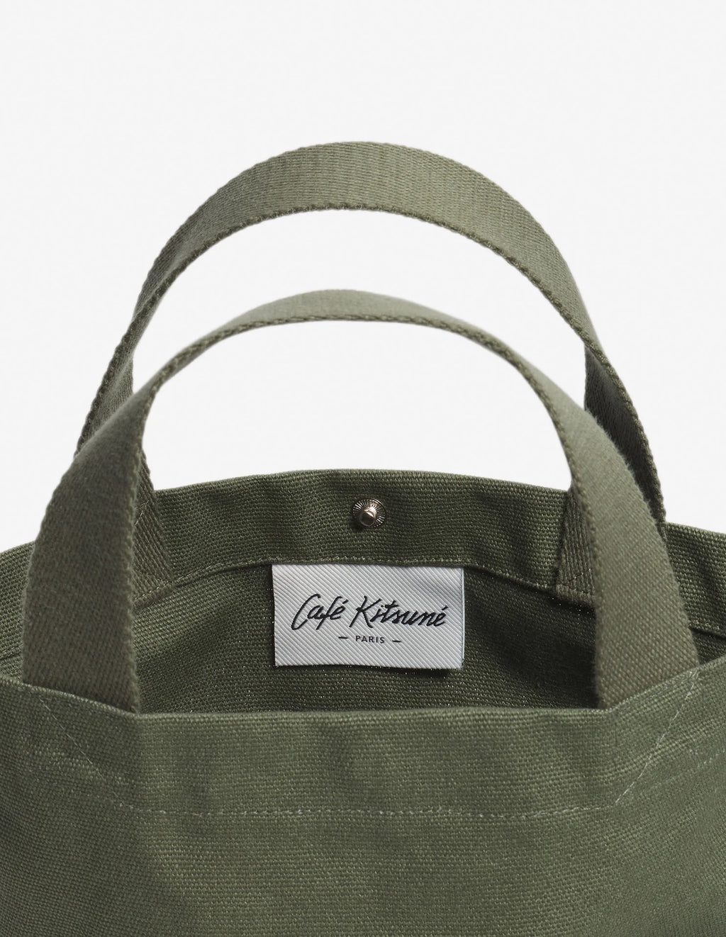 Intérieur du sac tote Café Kitsuné avec étiquette de marque