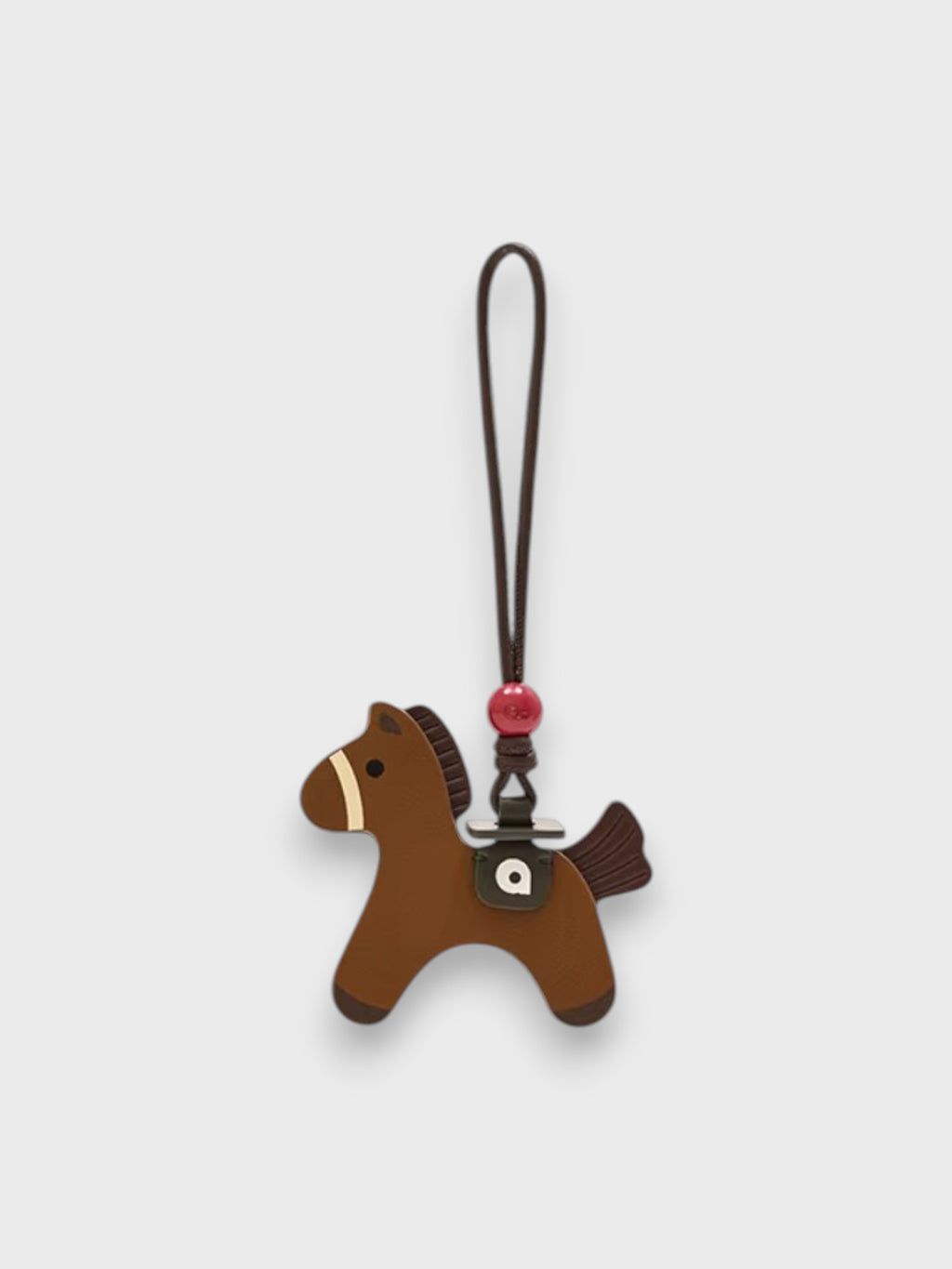 Breloque Cheval miniature MUVA marron en cuir, vue de face