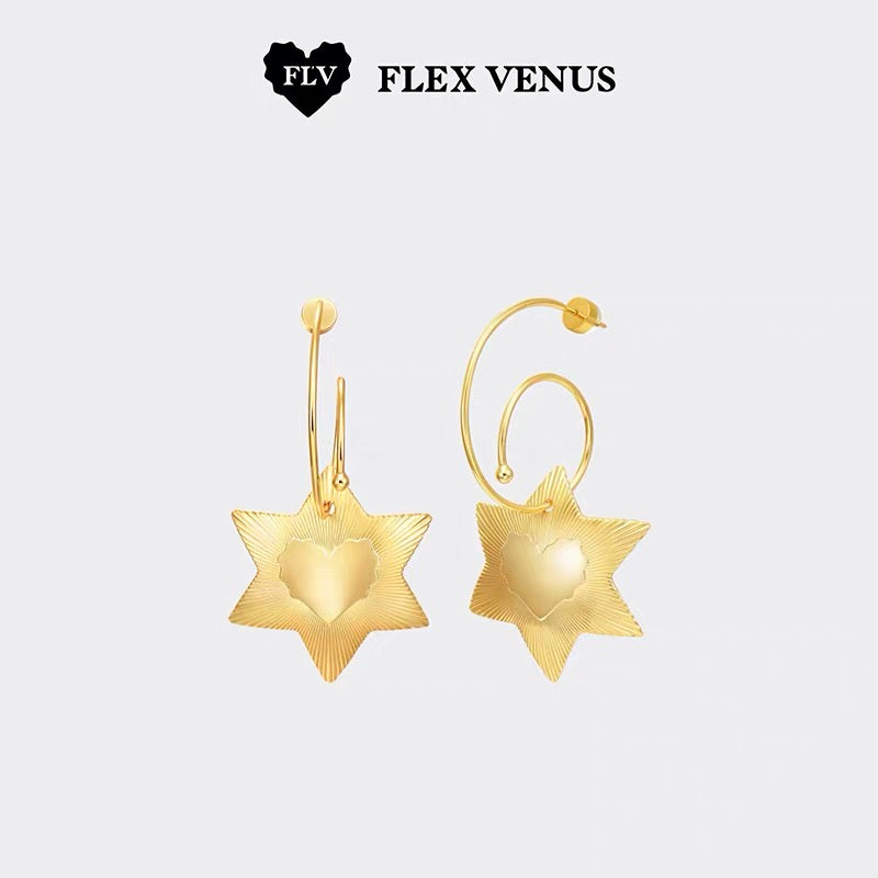 Alt text：
Paire de boucles d’oreilles étoiles dorées, style moderne et artistiqud