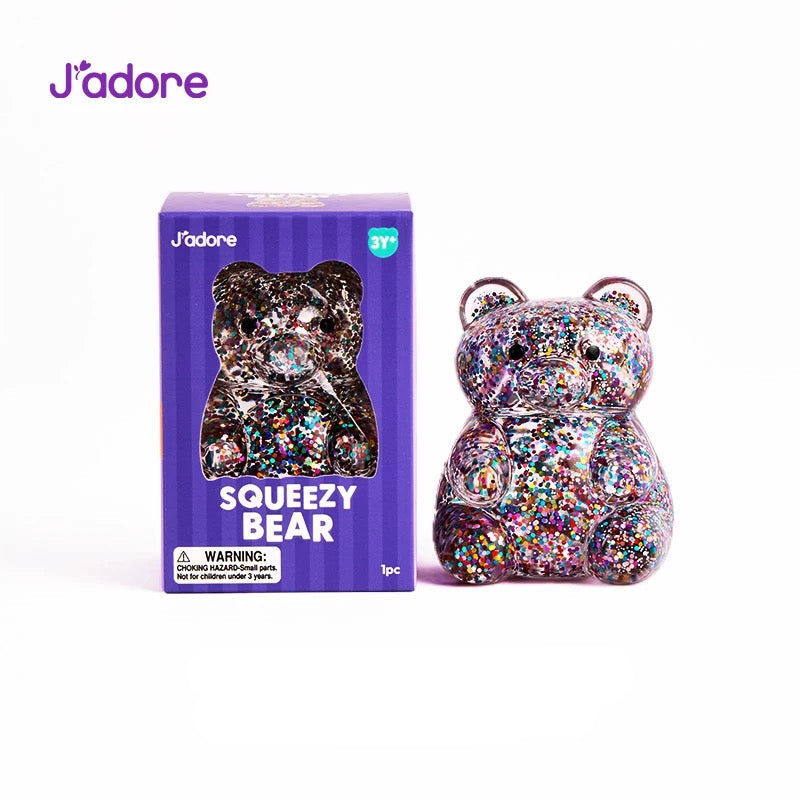 J'adore Glitter Squeezy Bear jouet sensoriel anti-stress ours paillettes violet, boîte violette

