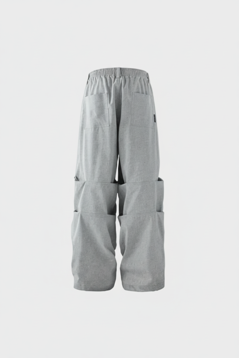 Pantalon cargo large BJHG gris avec multi-poches et ceinture élastique, vue de dos sur fond gris
