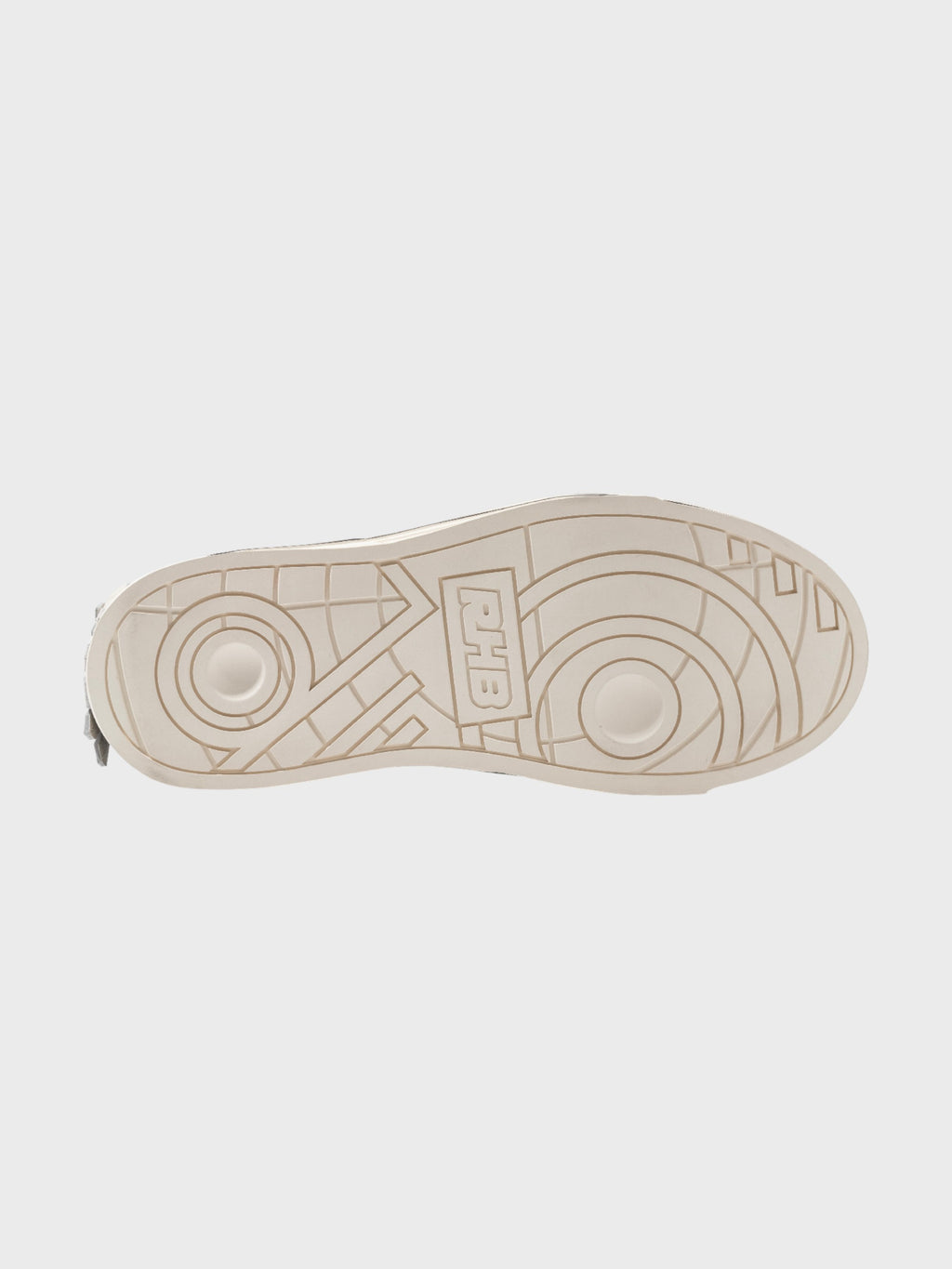 Radar Homing Beacon RHB sneaker – semelle extérieure beige crème avec logo RHB gravé en relief, motif géométrique cercles concentriques et lignes, vue de dessous, fond gris clair
