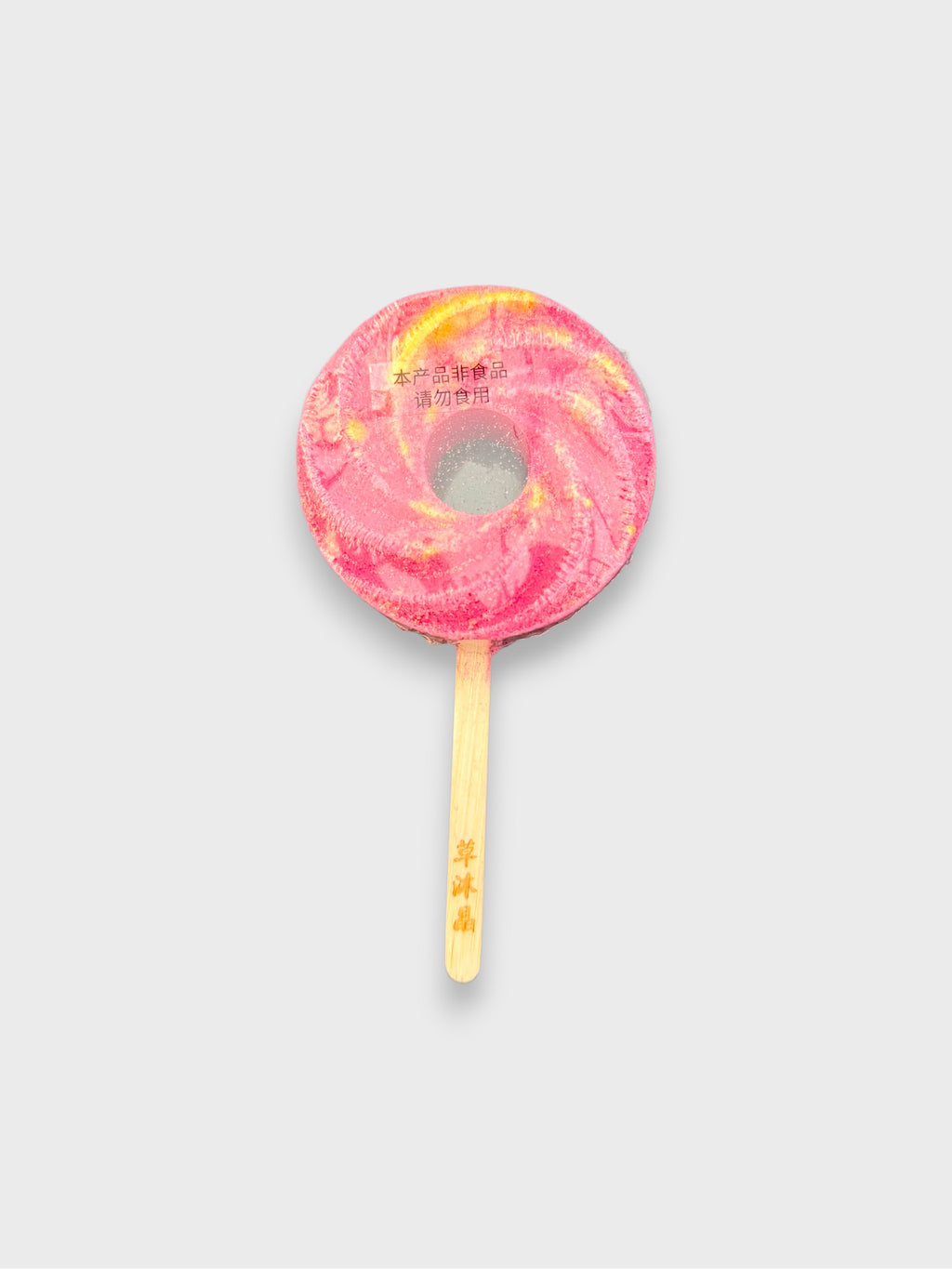 Bombe de bain artisanal Bath Fizz rose en sel de bain, vue de dessus