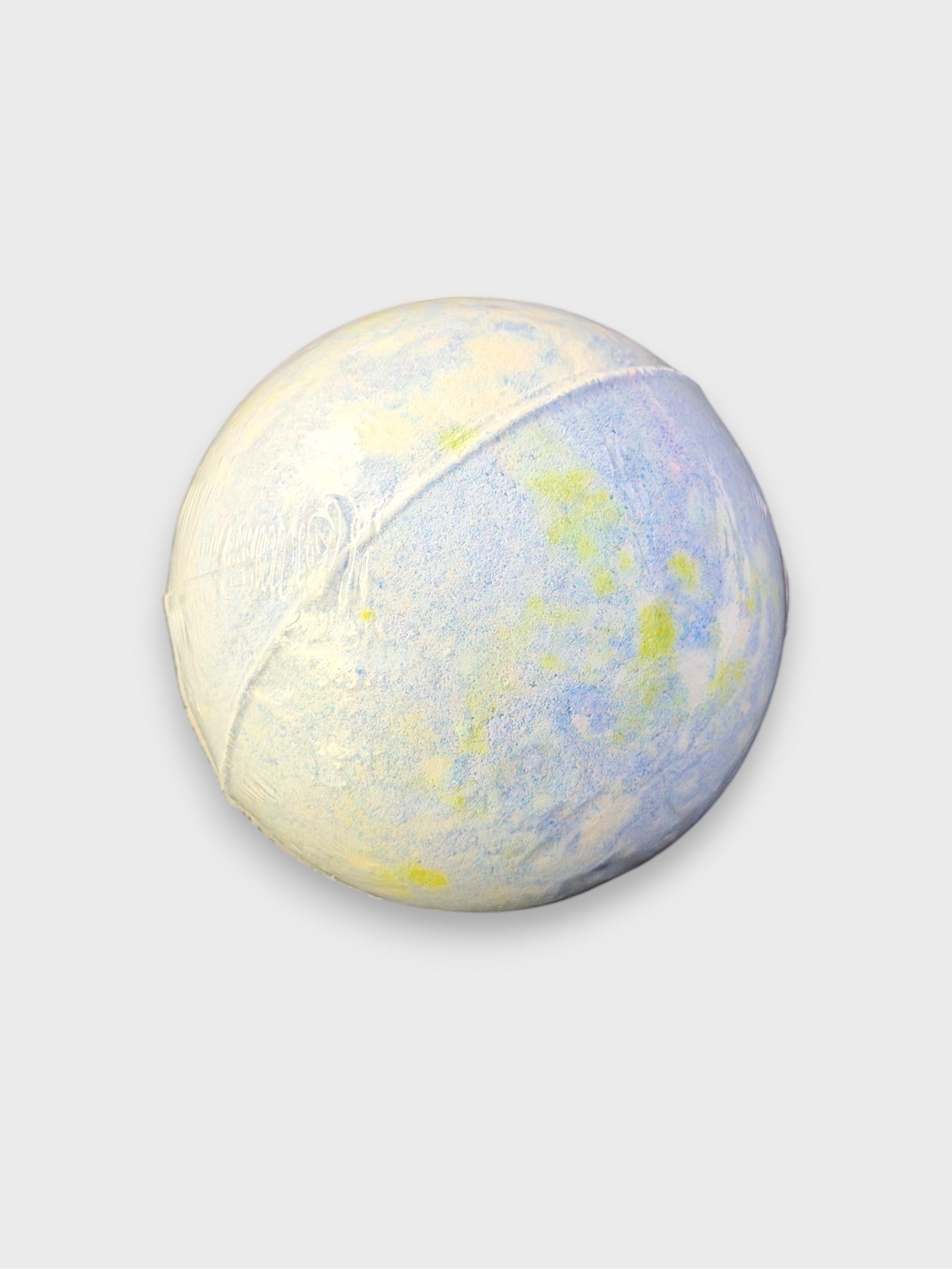 Bombe de bain artisanale bleue et jaune en bicarbonate, vue de dos