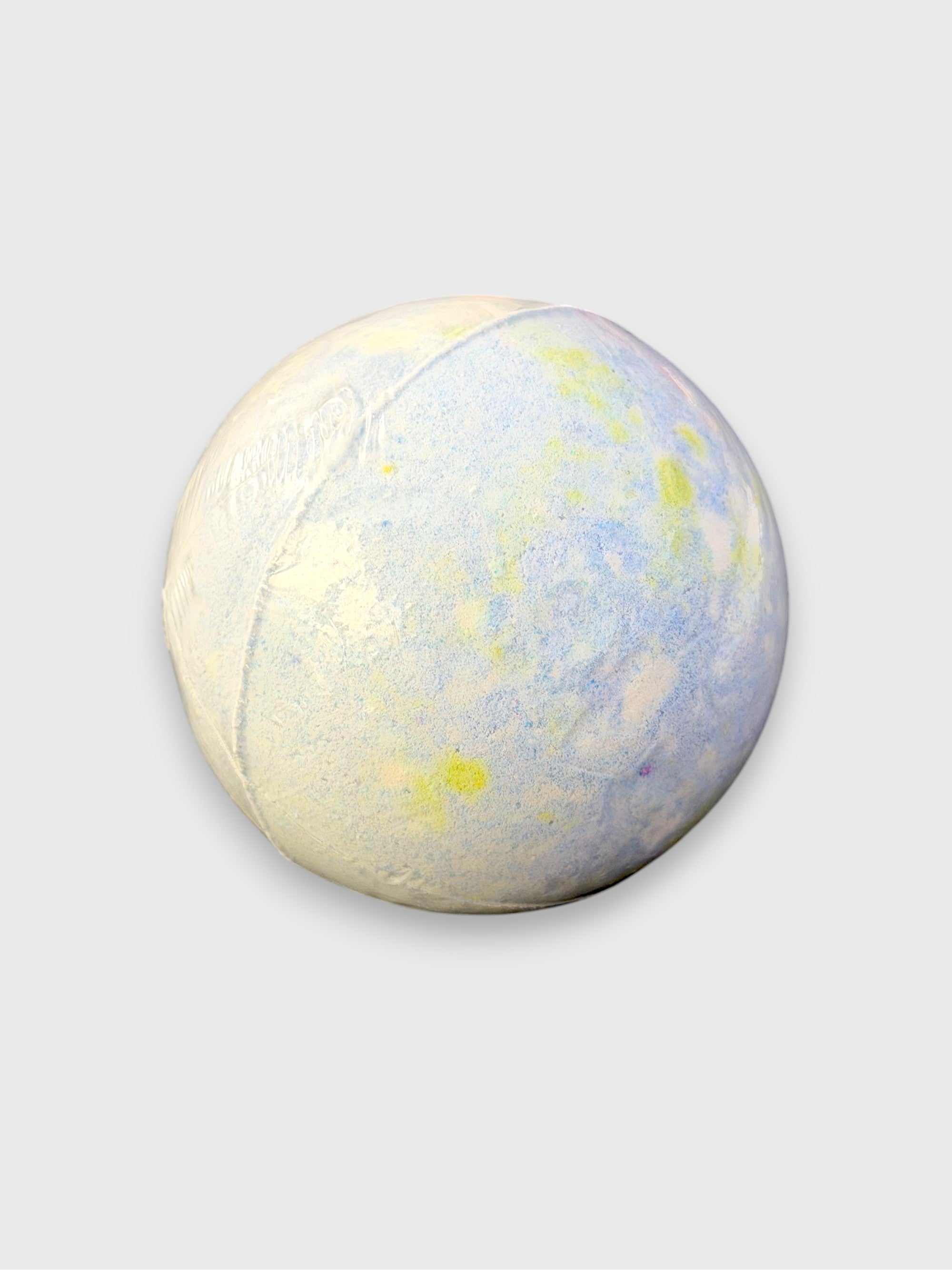 Bombe de bain artisanale bleue et jaune en bicarbonate, vue de face