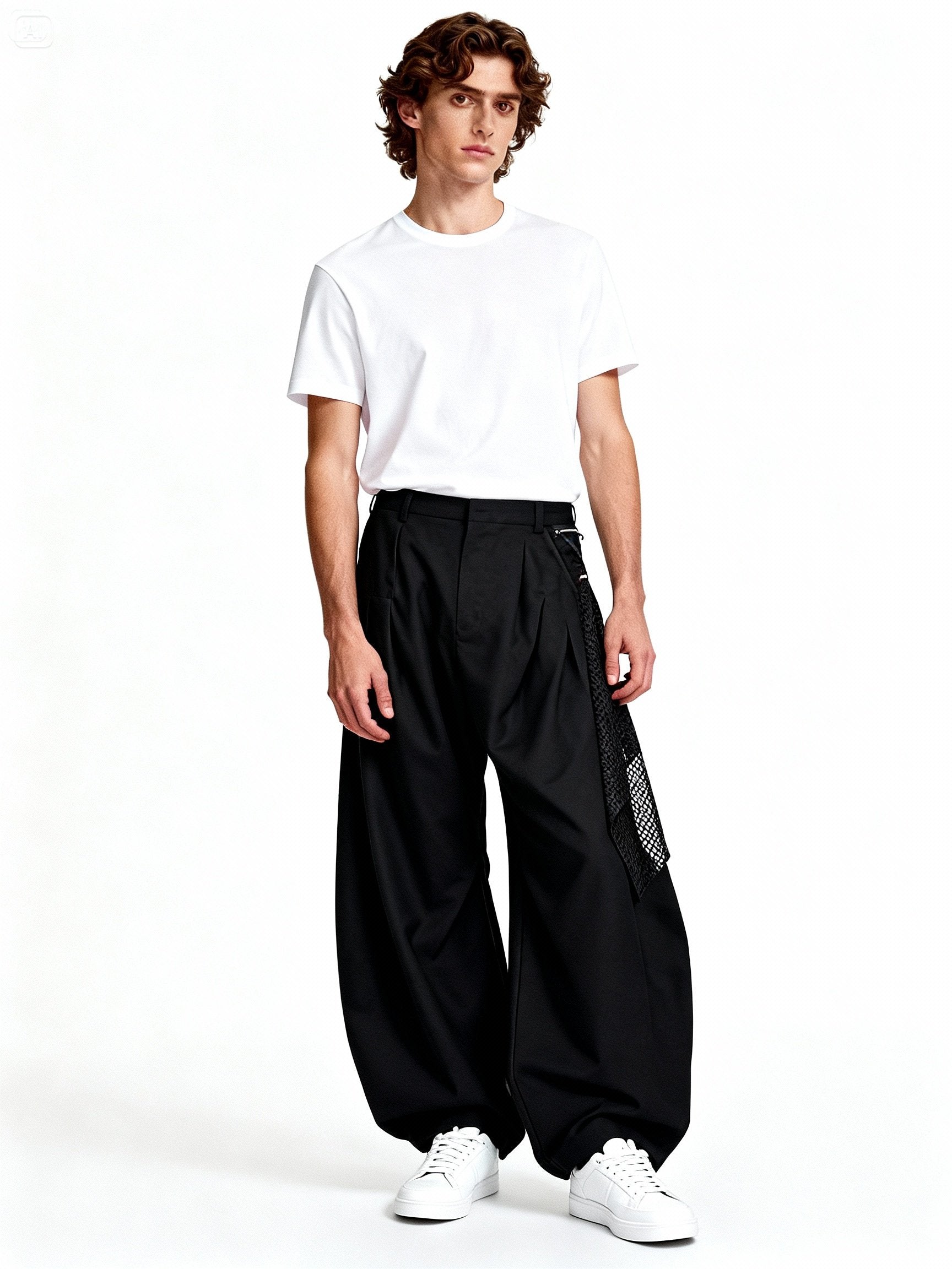 Pantalon RELABEL noir à plis structurés, détail du volume