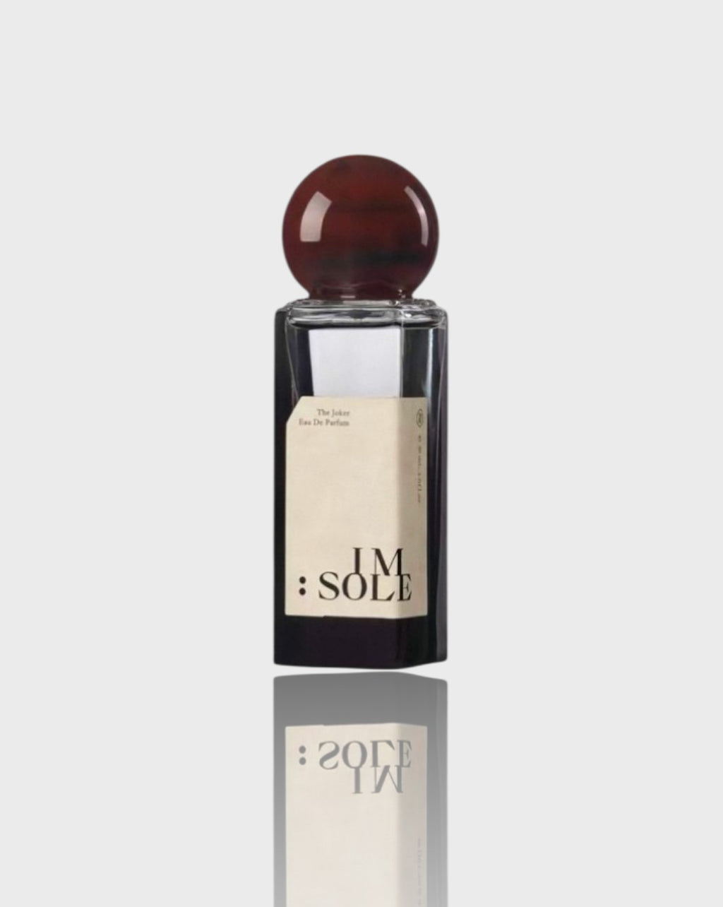 Eau de parfum flacon carré IMSOLE brun foncé en verre, vue de face