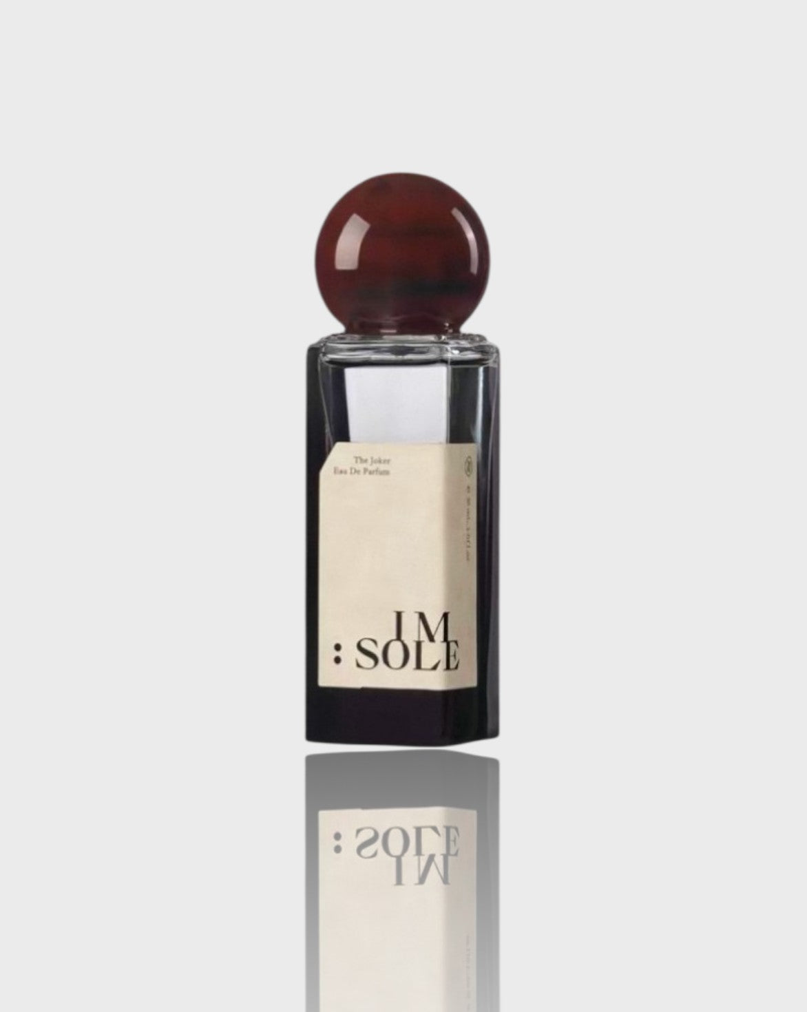 Eau de parfum flacon carré IMSOLE brun foncé en verre, vue de face