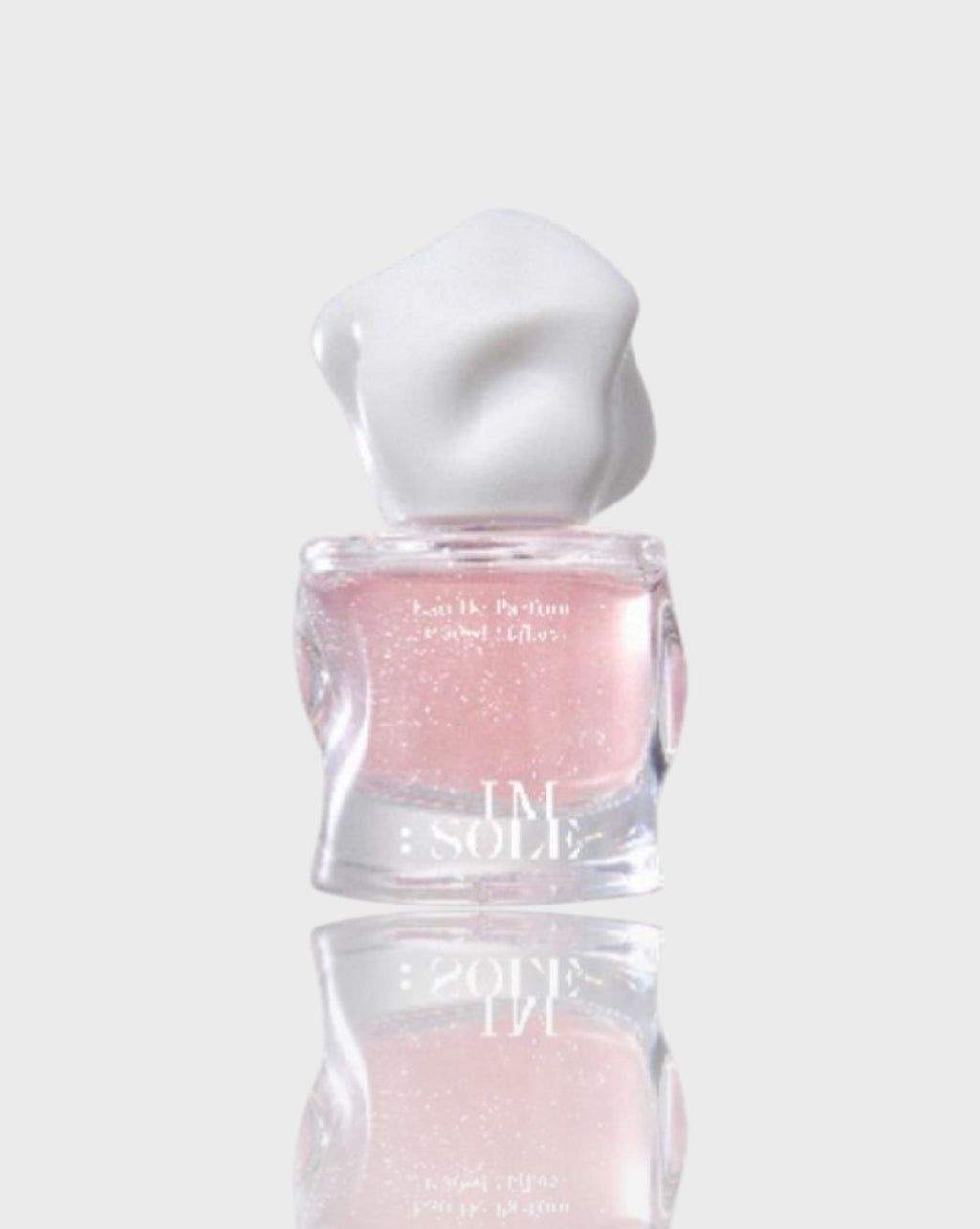 Eau de parfum verre sculpté IMSOLE rose glitter en verre, vue de face