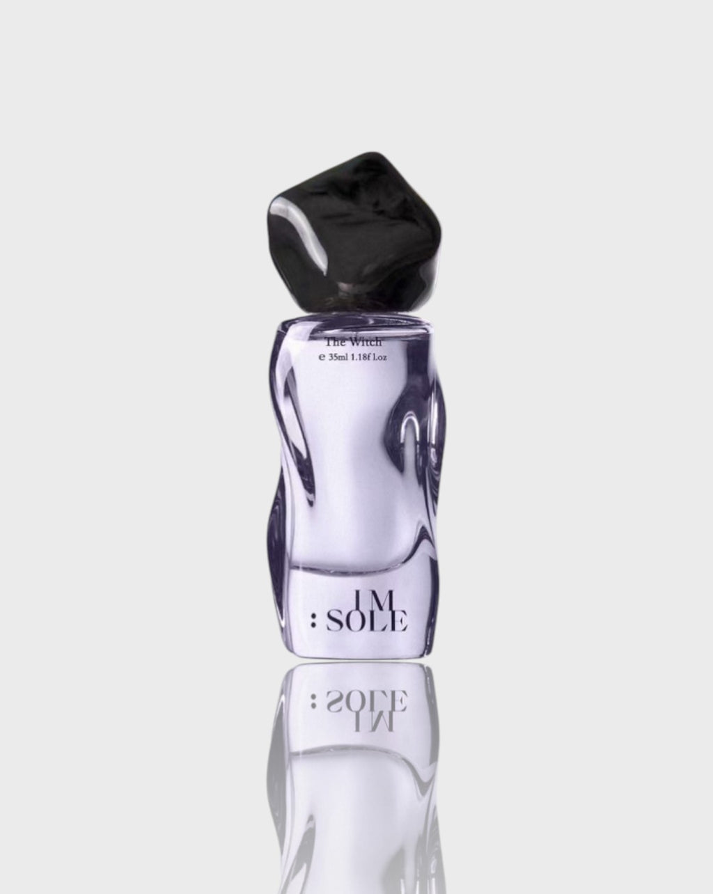 Eau de parfum verre sculpté IMSOLE violet pâle en verre, vue de face