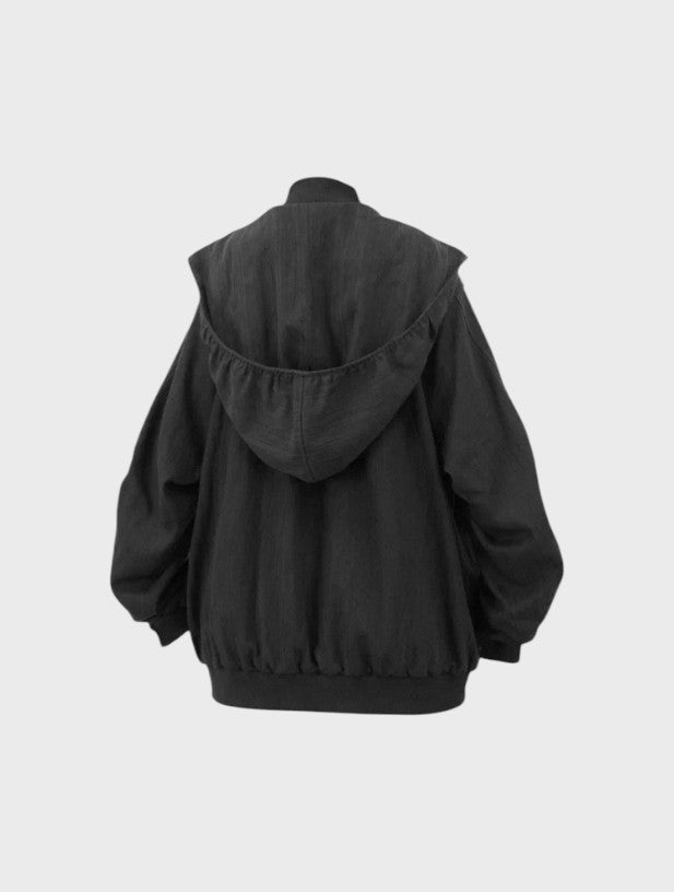 Hoodie zip capuche oversize RELABEL noir, vue de dos avec grande capuche drapée et manches ballon
