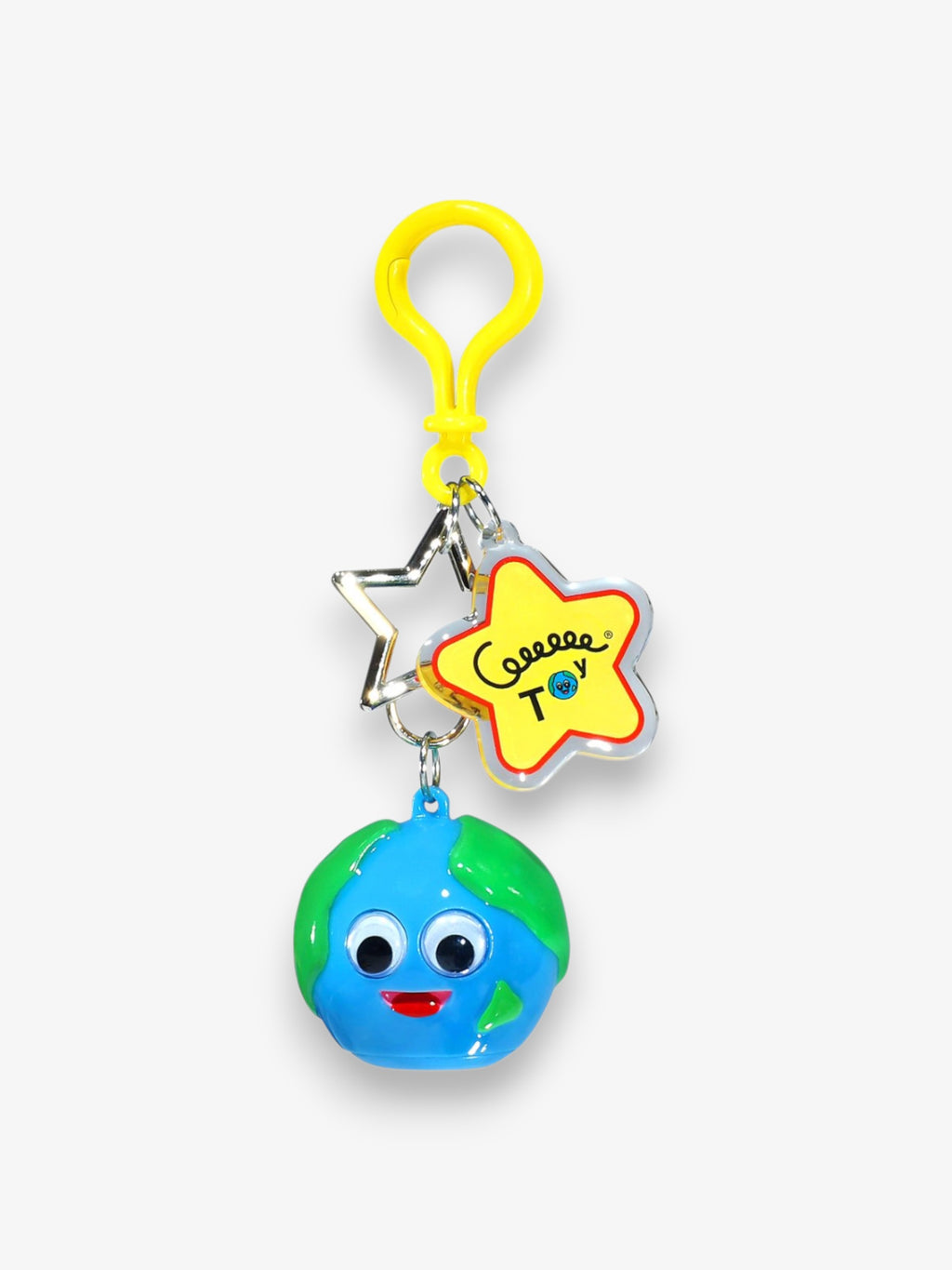 Leeeeeetoy Earthly sofubi keychain 2024 – porte-clés anneau jaune avec étoile dorée et pendentif globe terrestre bleu et vert souriant, fond blanc
