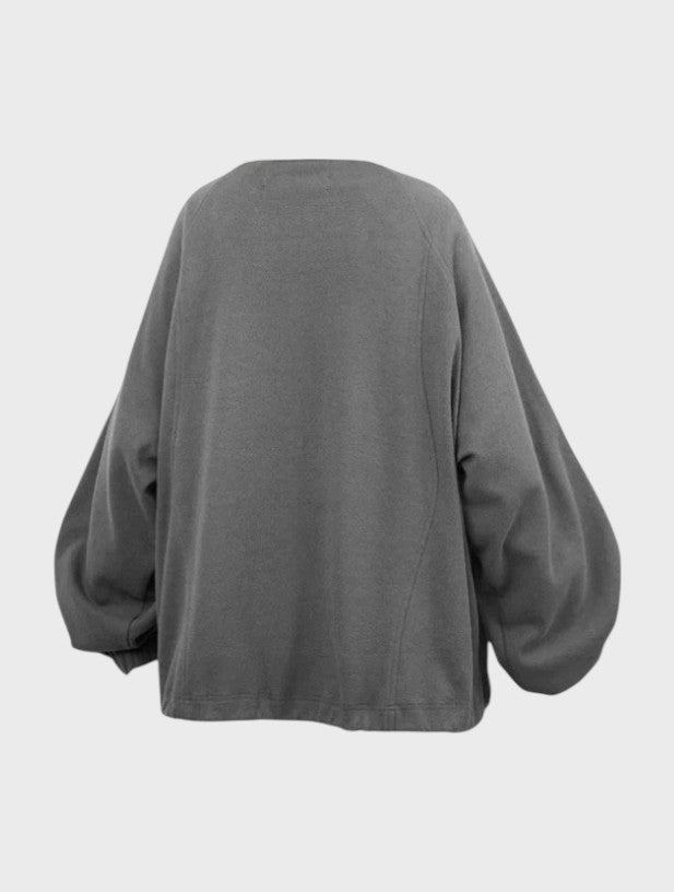 Sweat polo demi-zip oversize RELABEL gris, vue de dos avec manches ballon et bas élastiqué

