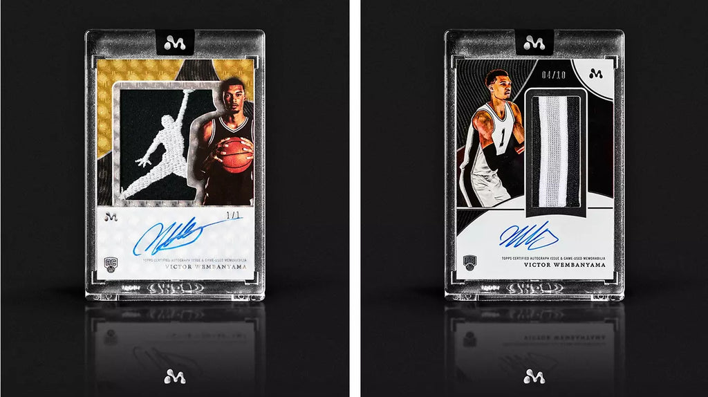 Topps Mercury Victor Wembanyama coffret ouvert révélant les packs de cartes Base Parallel et cartes à collectionner NBA dans un écrin noir, vue de dessus
